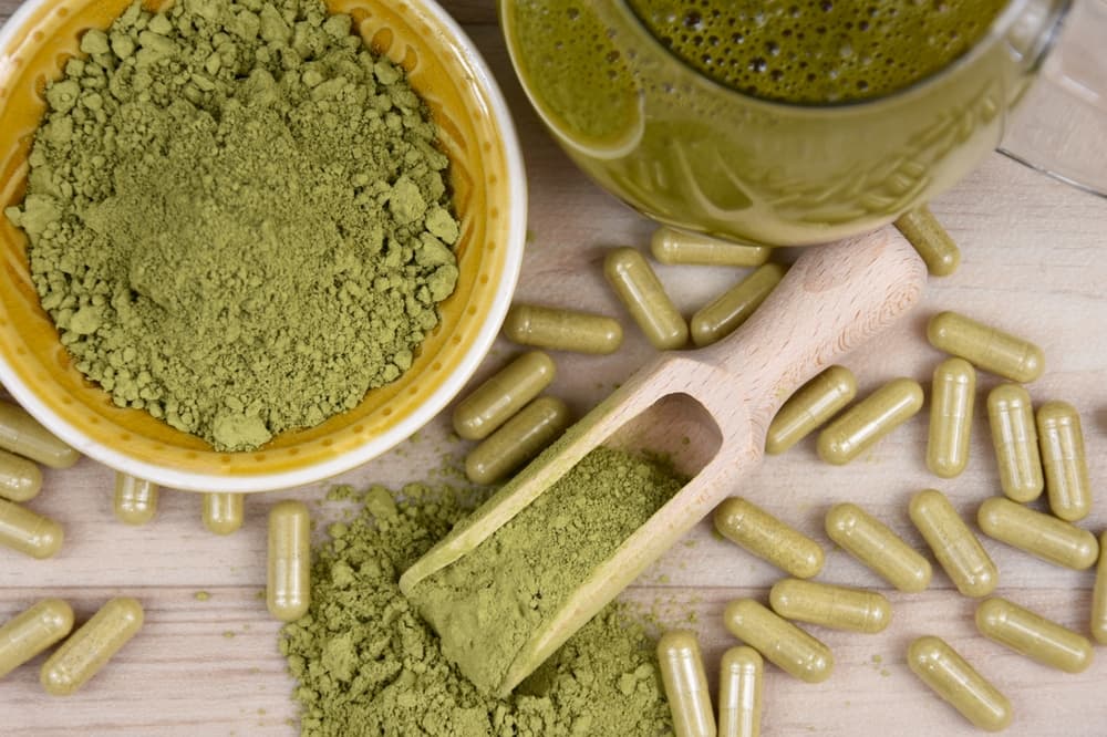 Golden Monk Kratom products including powders and capsules